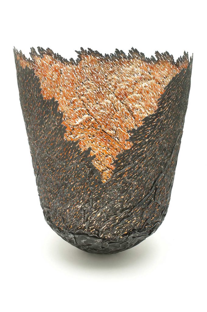Ridged Vessel, steel (re-formed tin-can), 23ct red gold, copper. H.35cm. Manchester Art Gallery.
