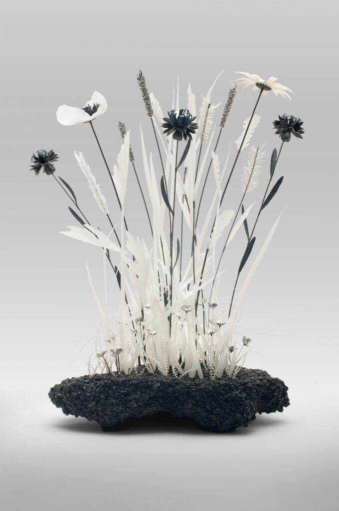 In our Hands: Meadow, Tarmac, recycled silver, plastics, aluminium, height 45cm